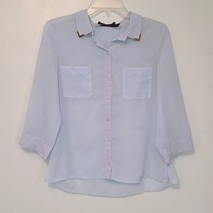 Chiffon top with gold hardware on collar